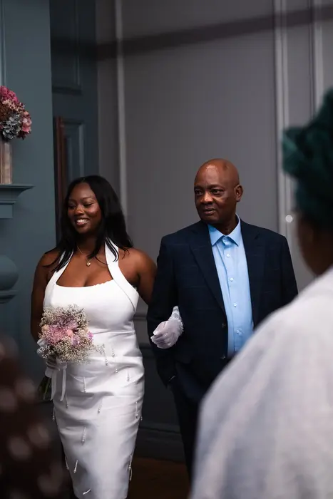 Bride arriving with her father on the wedding day, photographed by Imisi Bamiro, Coventry photographer