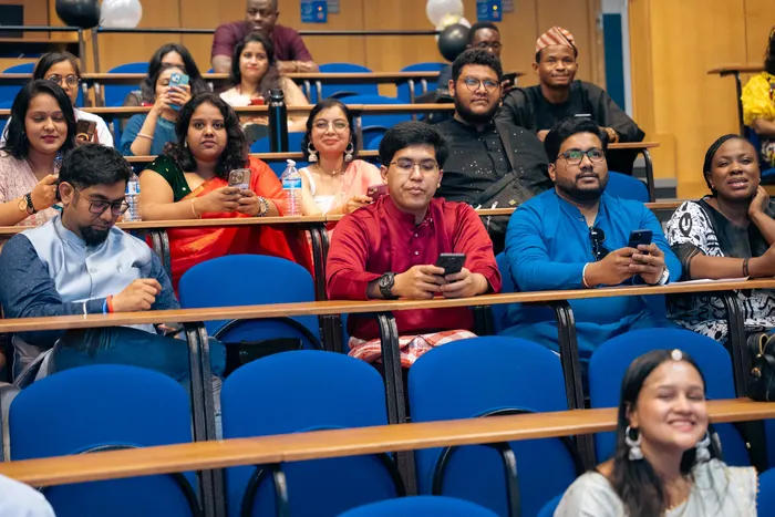Event photography at an alumni celebration, speakers and guests, photographed by Imisi Bamiro, Coventry photographer