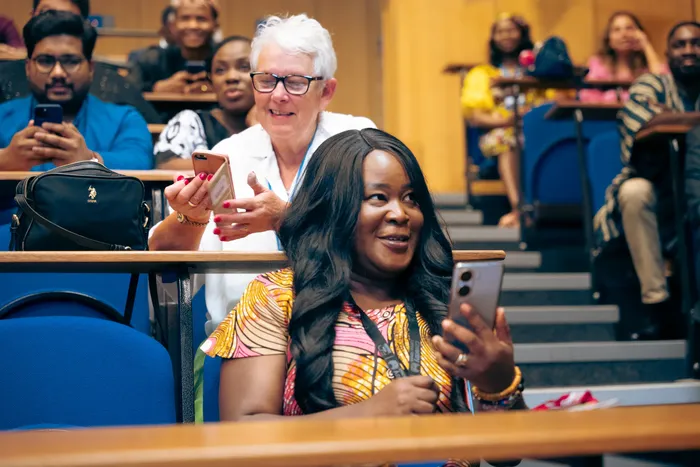 Event photography at an alumni celebration, speakers and guests, photographed by Imisi Bamiro, Coventry photographer