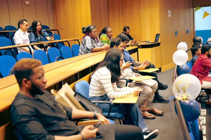 Event photography at an alumni celebration, speakers and guests, photographed by Imisi Bamiro, Coventry photographer