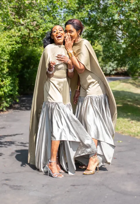 Group fashion shoot in satin gowns in a park, photographed by Imisi Bamiro, Coventry photographer