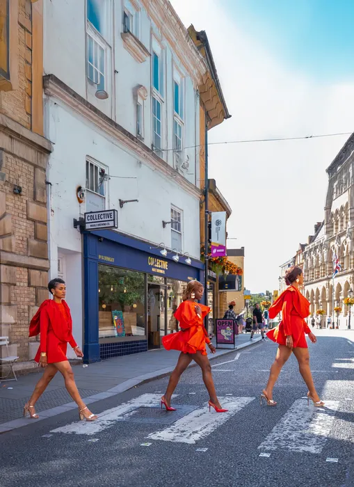 Three women in matching red dresses, fashion editorial, photographed by Imisi Bamiro, Coventry photographer