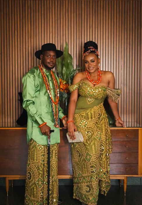 Traditional wedding portrait, couple in green and coral beads, photographed by Imisi Bamiro, Coventry photographer